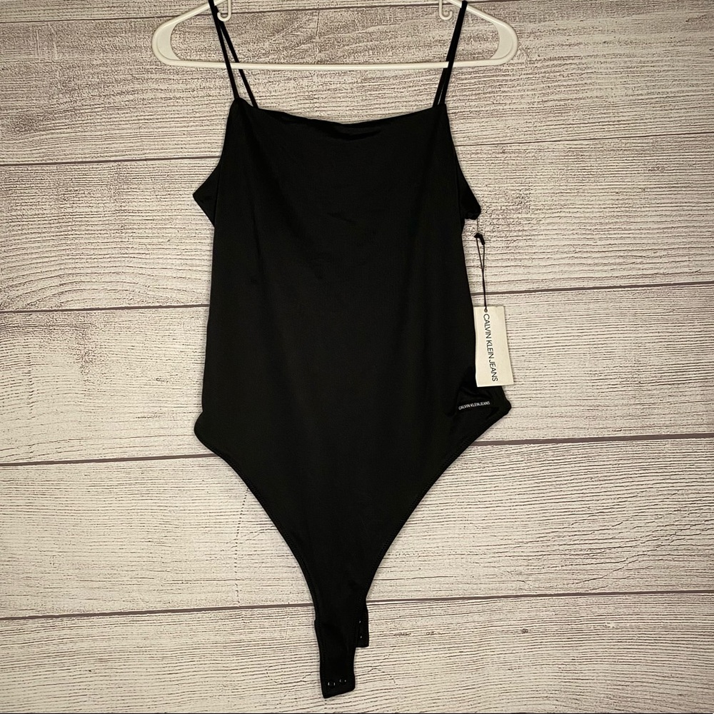 Calvin Klein Jeans Women’s black body suit with snaps- small new with tags